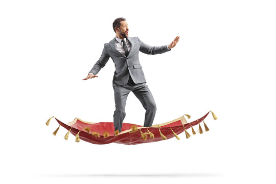 Businessman flying on a magic carpet
