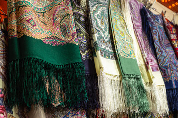 Russian colorful traditional scarfs for sale in a gift shop