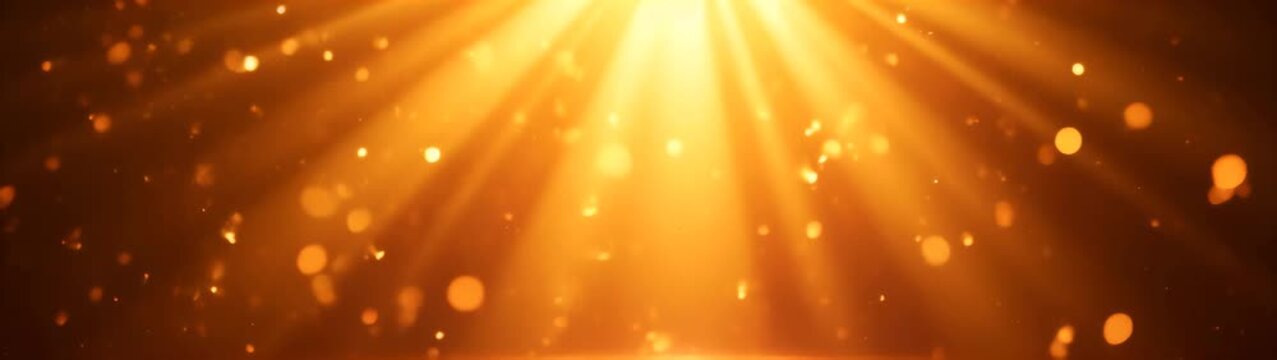 Yellow light shining down on a black background