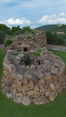 Ancient Nuraghe Arresi prehistoric stone tower in Sardinia aerial archaeological landscape