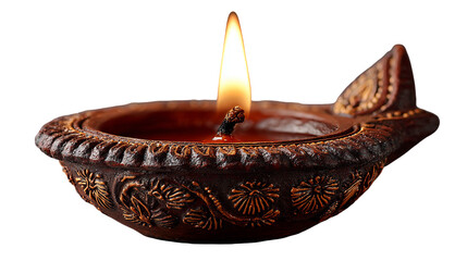 Traditional Indian clay lamp with flame on black background