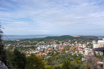 A sweeping view from Kruja Castle across the Albanian countryside, where rolling hills and open skies tell centuries of history.