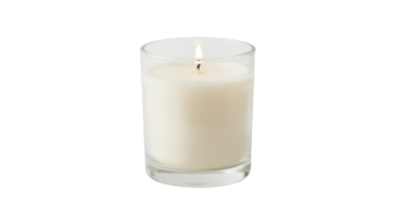 Candle burning in clear glass holder, creating soft light in dim room during evening hours, enhancing atmosphere of calm and comfort