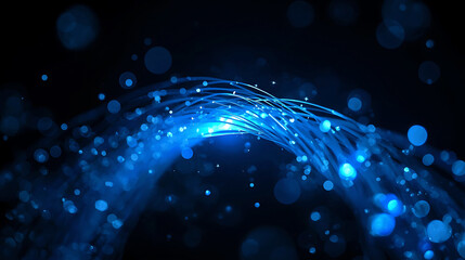 Glowing blue fiber optic cables with light particles on dark background
