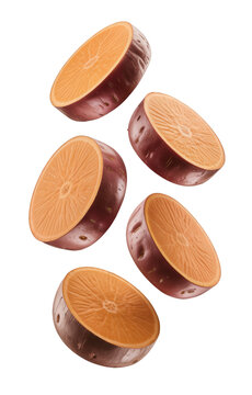 Halved sweet potatoes falling, fresh healthy raw food concept isolated on transparent background
