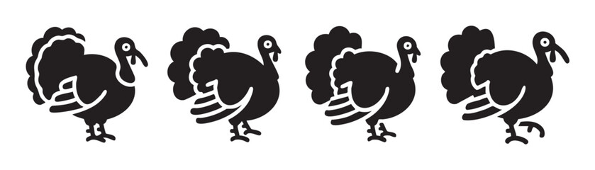 Fototapeta premium Four stylized black turkey icons standing in a row, representing Thanksgiving, harvest, and poultry themes in a simple graphic illustration.