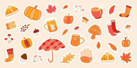 A colorful collection of autumn themed stickers including pumpkins and cozy clothing © BelaRani