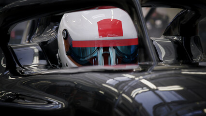 Fototapeta premium A fast racing car stands in the pitlane garage before the race