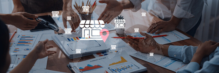 A dynamic team engages in a collaborative meeting analyzing charts and data visuals that symbolize opportunities for retail and e-commerce growth. Gantry
