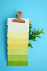 Vibrant color palette with green leaves on blue background