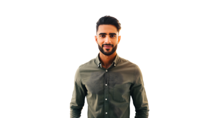 Confident young man in green shirt smiling at camera