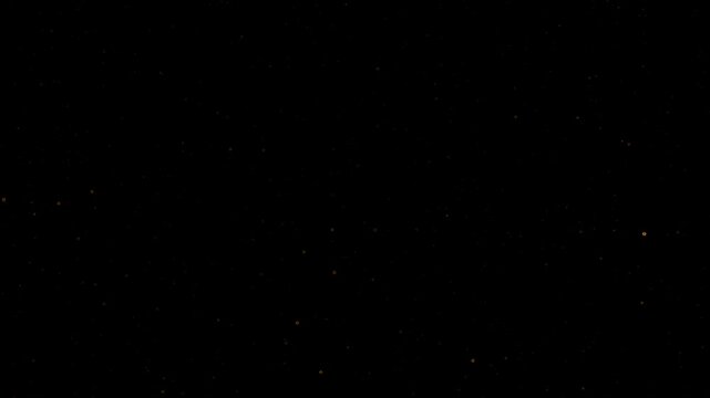 Loop glow flickering small gold ring dust stars particles animation motion on black abstract background. Glow stars particle on black background motion titles cinematic