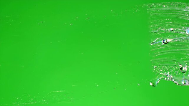 Green screen water wipe transition on glass with wet smear chroma key