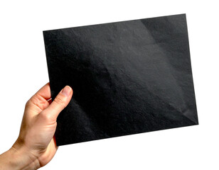Hand holding blank black sheet of paper isolated on white background