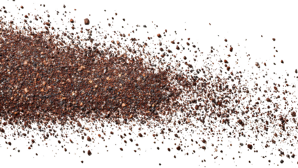 Dark brown granular particles, possibly coffee grounds or soil, scattered and spread across a clean white background, creating a textured pattern.