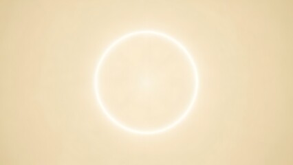 Solar eclipse with bright ring of light in the sky