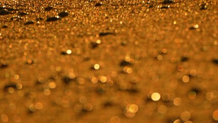 Sunlight Sand Beach A close-up of the sand on a beach bathed in sunlight.