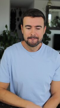 Judgy man laughing at something 