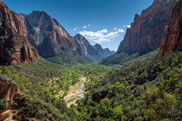 Fototapeta premium Dramatic Zion Canyon Vista - Virgin River Flows Through Lush Valley Framed by Towering Sandstone Cliffs Under Blue Sky.
