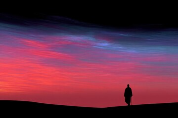 A serene silhouette of a figure against a vibrant, multicolored sky at sunset, evoking feelings of peace and contemplation.