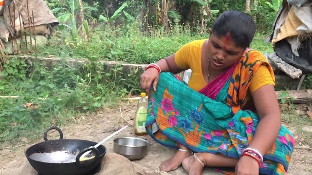 Rural Indian Woman Cooking Outdoors in Traditional Village Kitchen, Preparing Food on Wood Fire Chulha, Authentic Indian Lifestyle, Culture and Rural Life