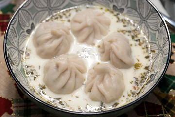 Traditional Georgian dish khinkali - Hinkali - Boiled khinkali with lamb or beef or cheese. High quality photo