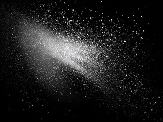 Obraz premium Black background with white particles creating a bright trail, abstract artistic design