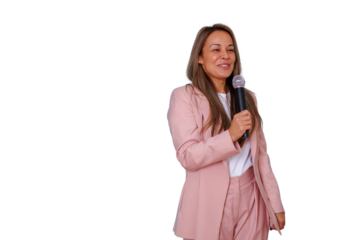 Woman in pink suit speaking with microphone, engaging audience during professional presentation on transparent background