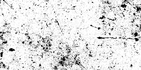 An abstract black and white overlay featuring prominent scratches and scattered grunge elements.