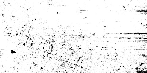 A detailed black and white grunge texture revealing an abstract pattern of scratches and dots.