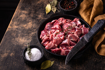 Raw chopped meat with spices