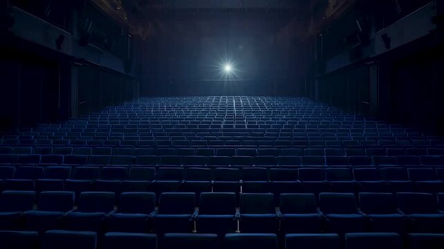 Empty dark cinema theater auditorium blue seats rows empty screen glowing light cinema hall interior