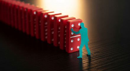 Close-up of red domino tiles in row, a green silhouette of person stopping them, representing control, prevention, and risk management concepts