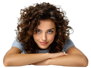 Embracing Natural Curls: A captivating portrait showcases a woman with a cascade of radiant, voluminous curly hair, exuding confidence and natural beauty.