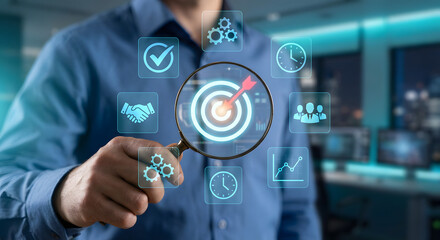 Businessman analyzing target with magnifying glass and digital icons