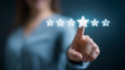 A person uses their index finger to select a star from a row of five glowing white stars, indicating a rating