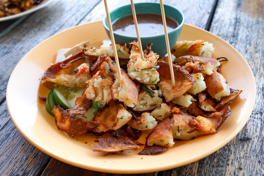 Crispy Cucur Udang with Dipping Sauce and Fresh Cucumbers