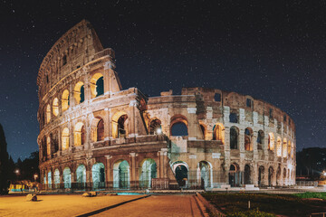 Fototapeta premium Rome, Italy. Colosseum Also Known As Flavian Amphitheatre In Evening Or Night Time.