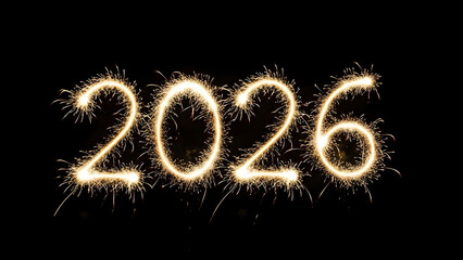 Golden sparkler writing "2026" glowing with bright sparks on black background for New Year celebration.