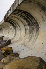 two-meter-high concrete sea wall