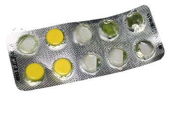 A blister pack of pills on a white background