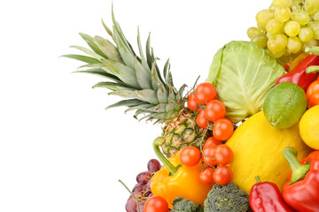 Large assortment of fresh colorful fruits and vegetables isolated on white.