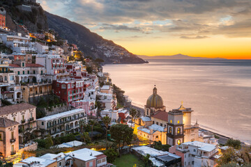 Positano, Italy along the Amalfi Coast at dusk.