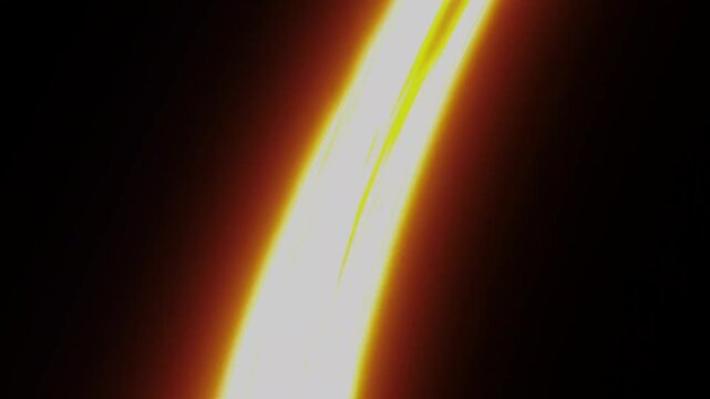 The light leak in the blac bacground.