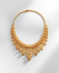 Intricate gold necklace with leaf design