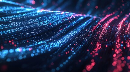 A vibrant, abstract digital artwork featuring a swirling pattern of blue and red particles against a dark, almost black background.