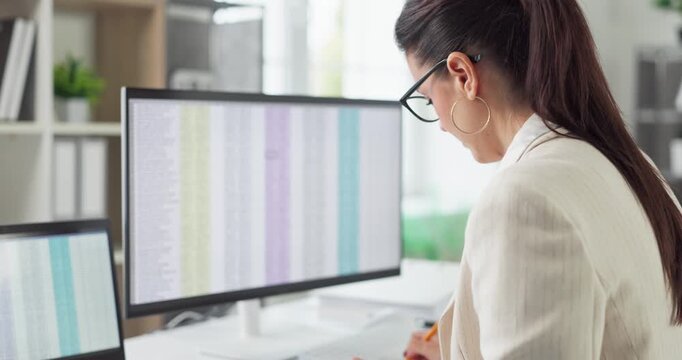 Auditor woman accountant in office reviewing finance. She checks spreadsheet data on computer monitors for analysis, bookkeeping, reporting and compliance. Clear finance audit concept theme.