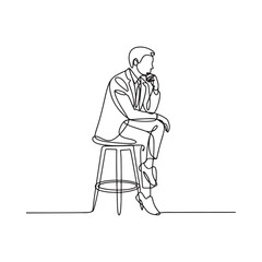 Obraz premium A contemplative man in a suit sits on a stool lost in thought