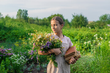 Woman with medicinal herbs. Selective focus.