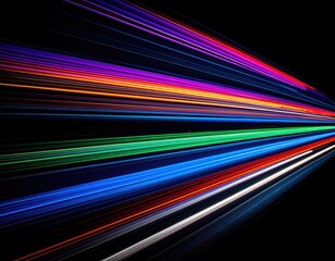 Colorful streaks of light burst across a black background, creating a vibrant visual effect